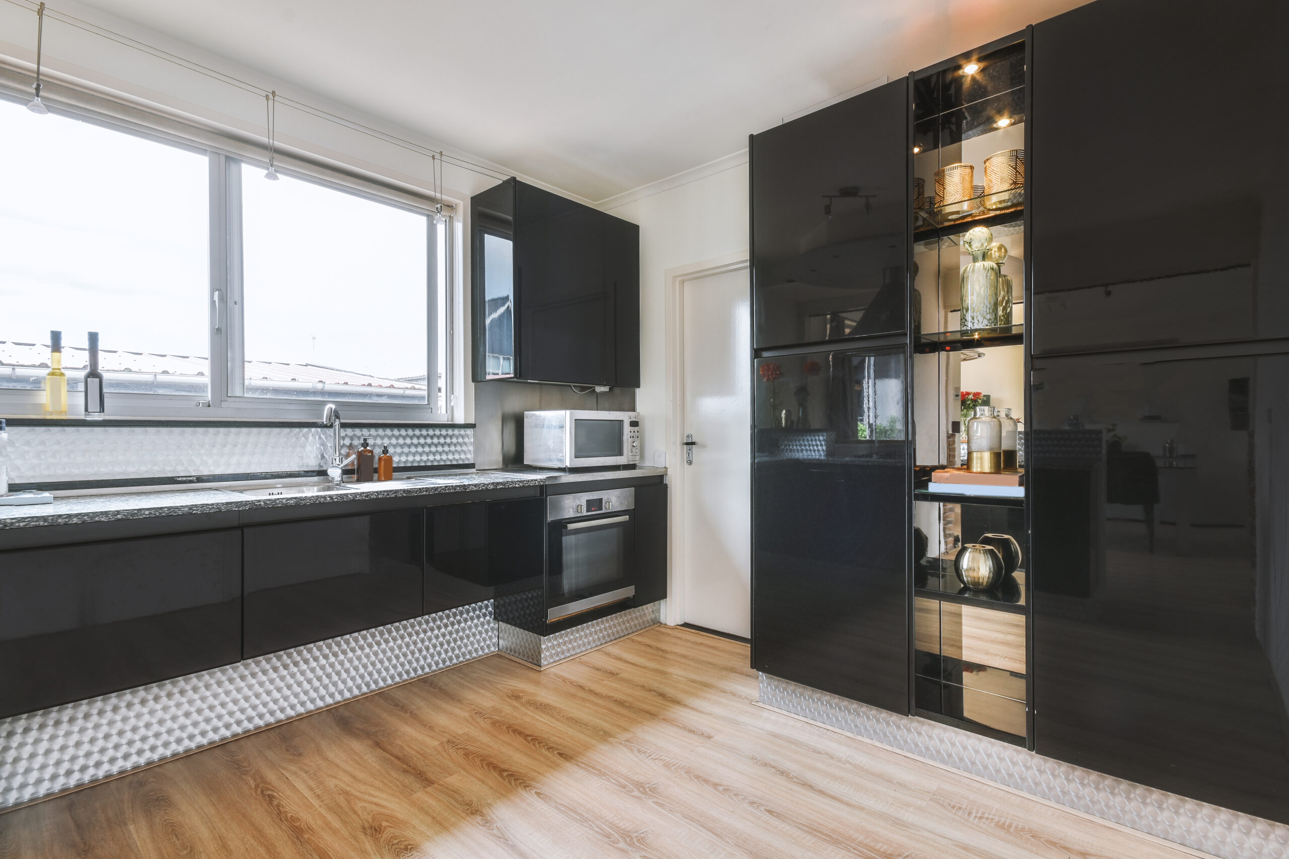 Studio apartment interior with wooden furniture